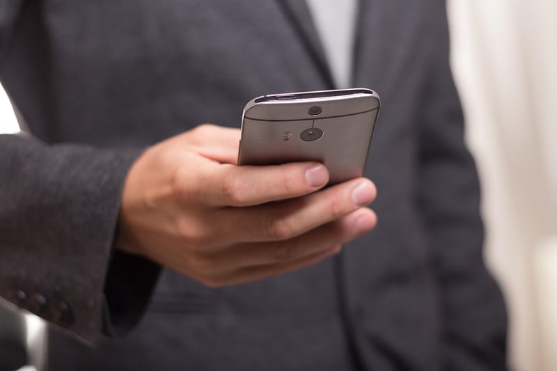 Business Woman with Smartphone